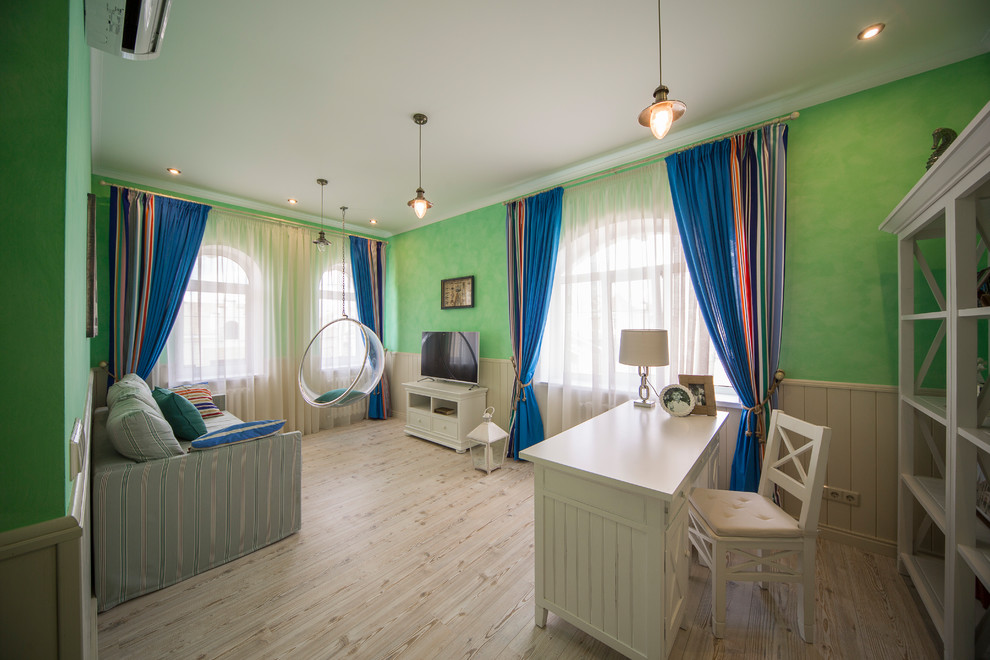 This is an example of a medium sized contemporary kids' bedroom for boys in Moscow with green walls, laminate floors and beige floors.