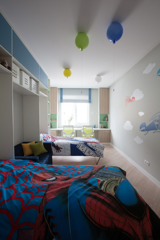 Design ideas for a small scandi children’s room for boys in Other with grey walls and laminate floors.