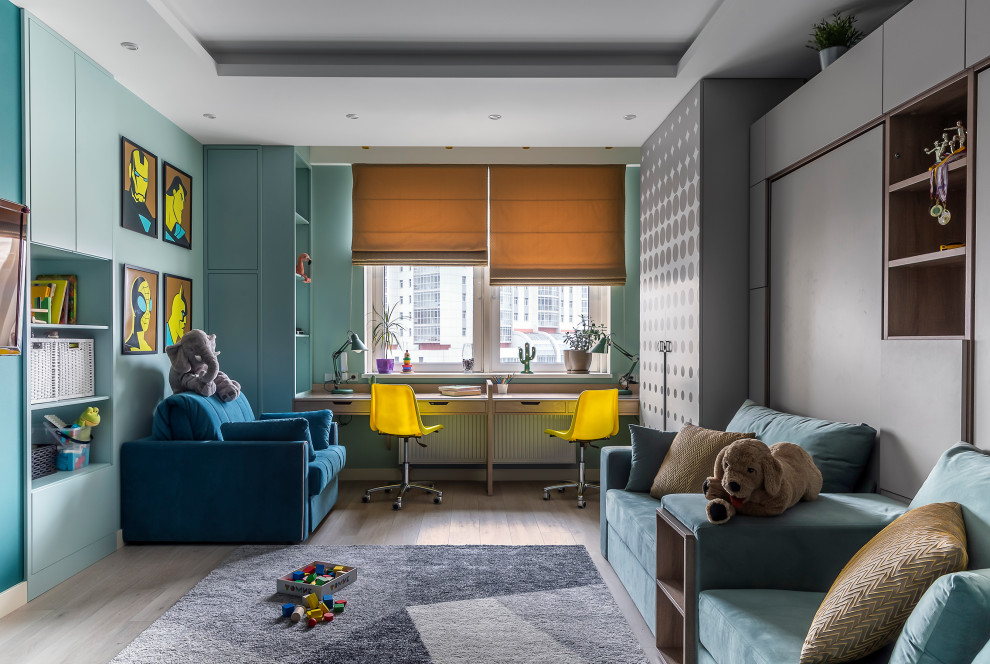На фото: нейтральная детская в современном стиле с рабочим местом, синими стенами, светлым паркетным полом, бежевым полом и многоуровневым потолком
