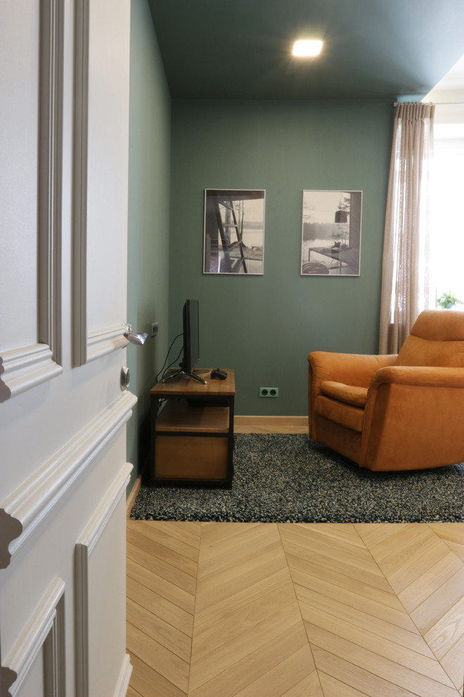 Photo of a medium sized contemporary kids' bedroom for boys in Moscow with green walls, medium hardwood flooring and beige floors.