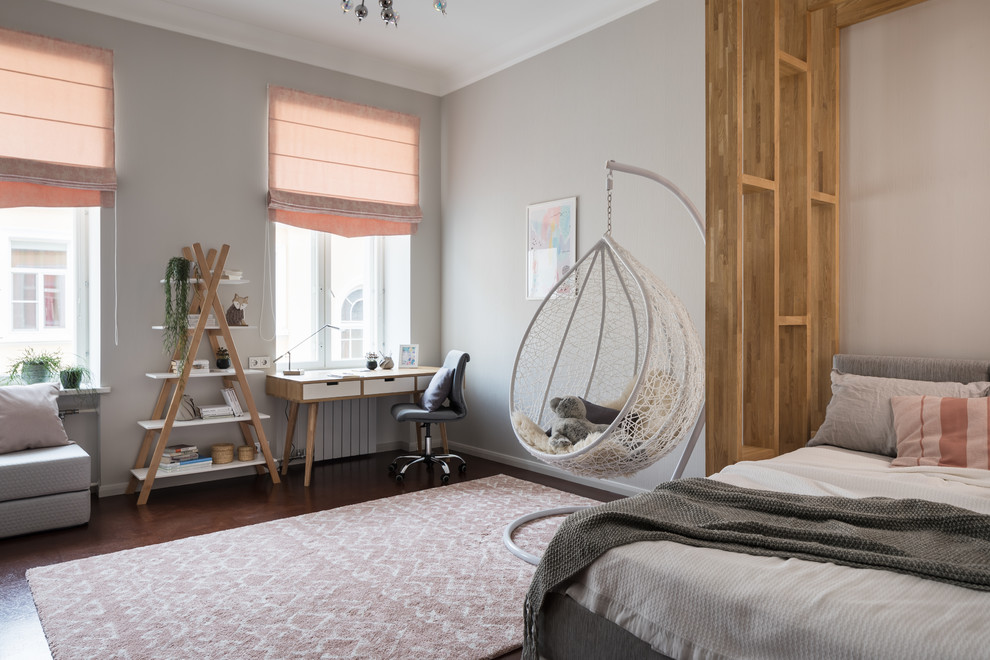 Inspiration for a scandi kids' bedroom for girls in Saint Petersburg with grey walls, dark hardwood flooring and brown floors.