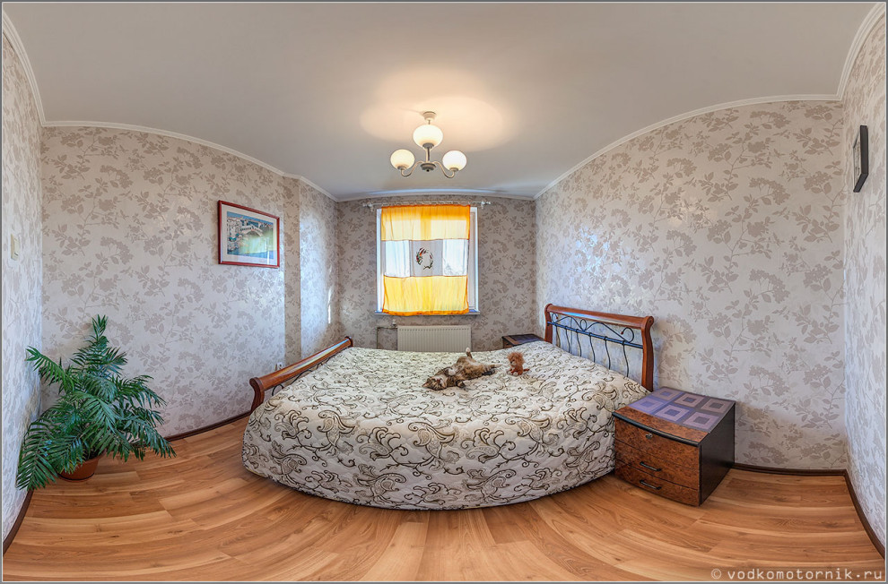 Photo of a small contemporary toddler’s room for boys in Other with beige walls, laminate floors and beige floors.