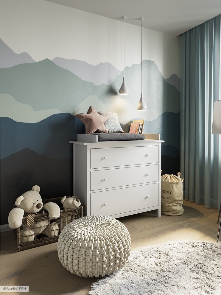 Diseño de dormitorio infantil de 1 a 3 años contemporáneo de tamaño medio con paredes azules, suelo laminado y suelo beige