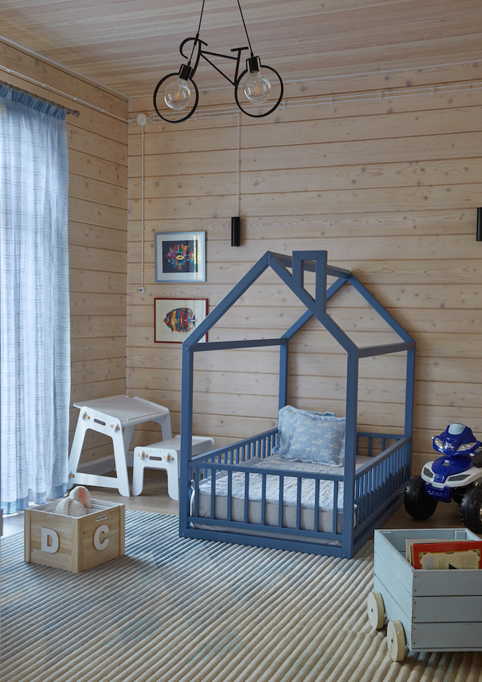 Cette image montre une chambre d'enfant nordique.