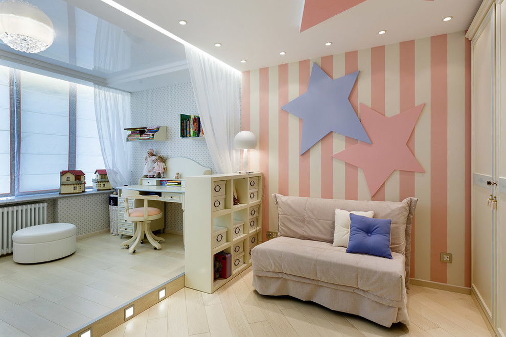 Example of a large eclectic girl light wood floor and beige floor kids' room design in Saint Petersburg with multicolored walls