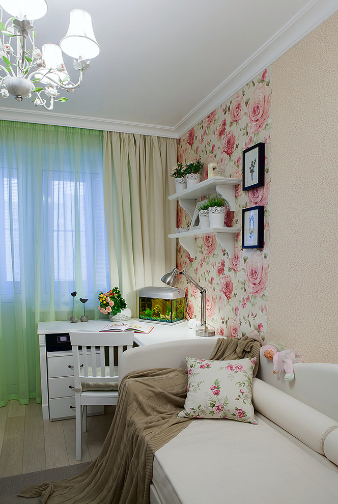 Design ideas for a contemporary kids' bedroom for girls in Moscow with beige walls and light hardwood flooring.