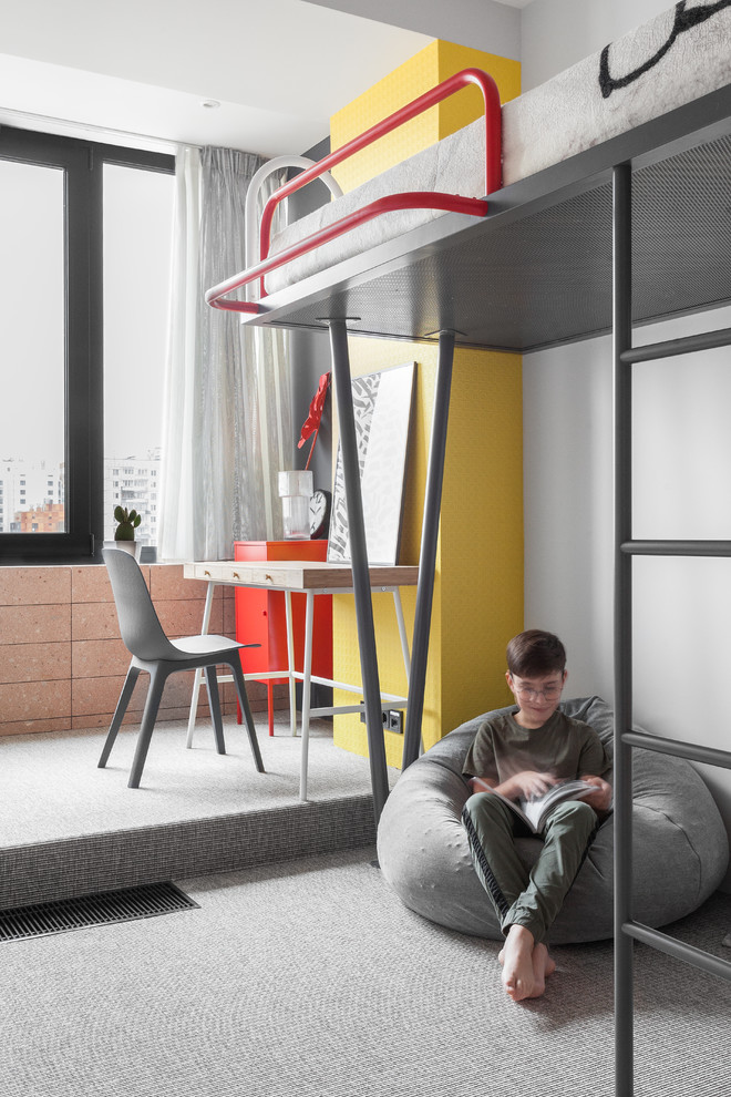 Стильный дизайн: детская в стиле модернизм с рабочим местом, желтыми стенами, ковровым покрытием и серым полом для мальчика - последний тренд