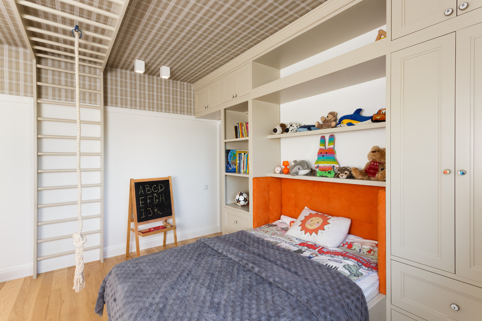 Trendy medium tone wood floor and beige floor kids' bedroom photo in Moscow with white walls