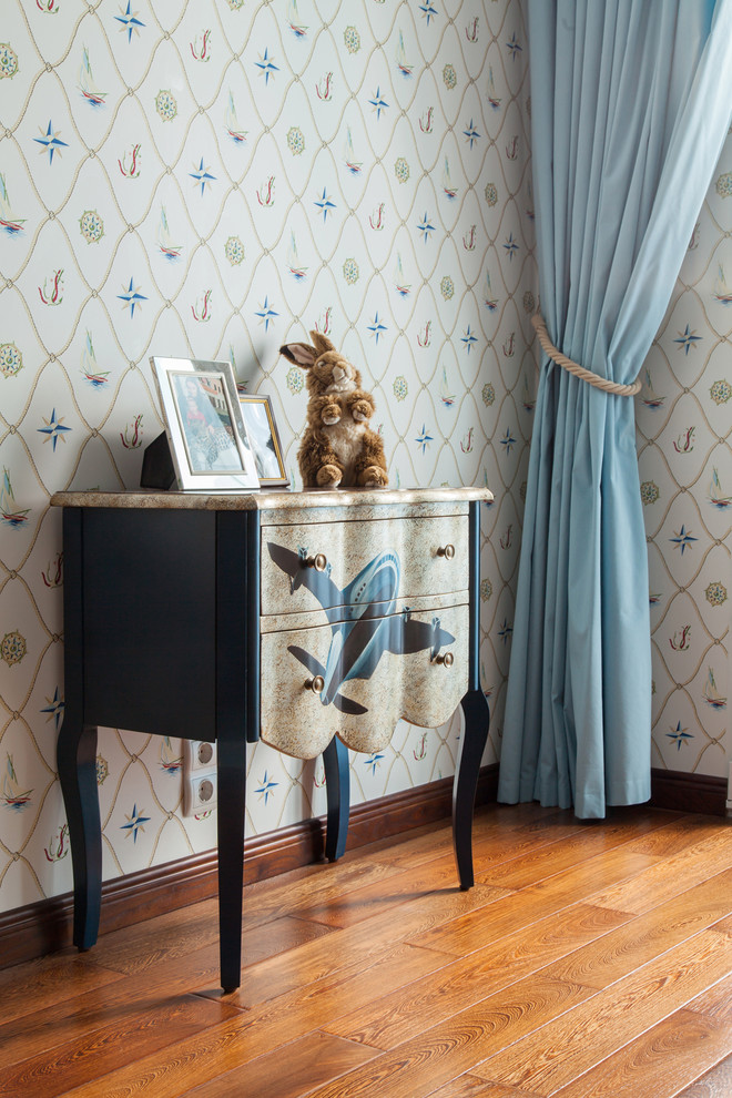 Photo of a medium sized coastal kids' bedroom for boys in Moscow with blue walls and medium hardwood flooring.