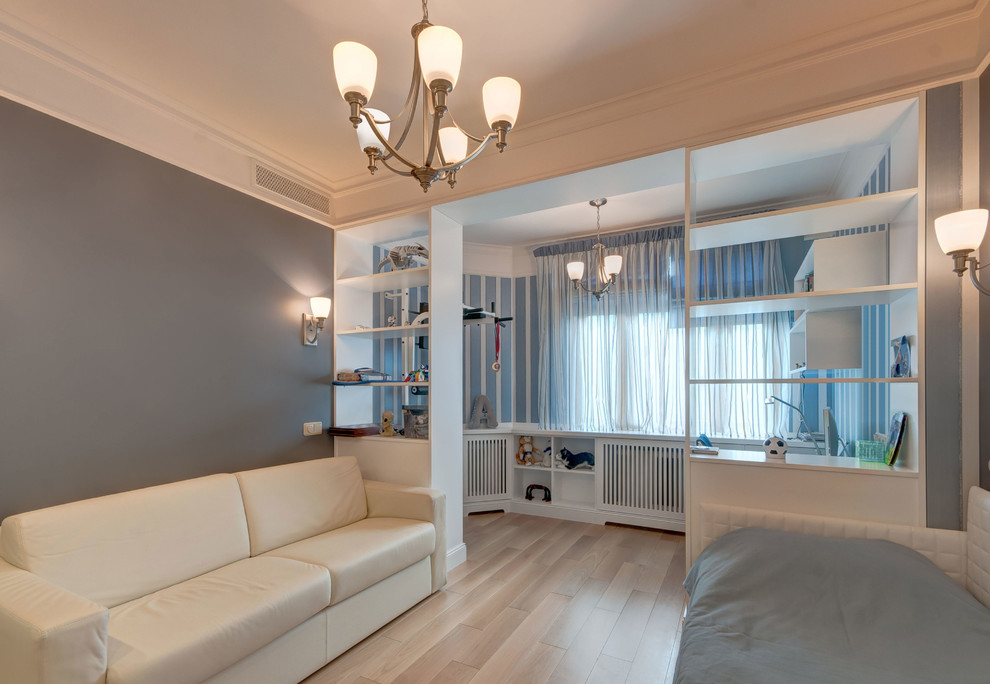 Medium sized classic teen’s room for boys in Moscow with blue walls, medium hardwood flooring and beige floors.