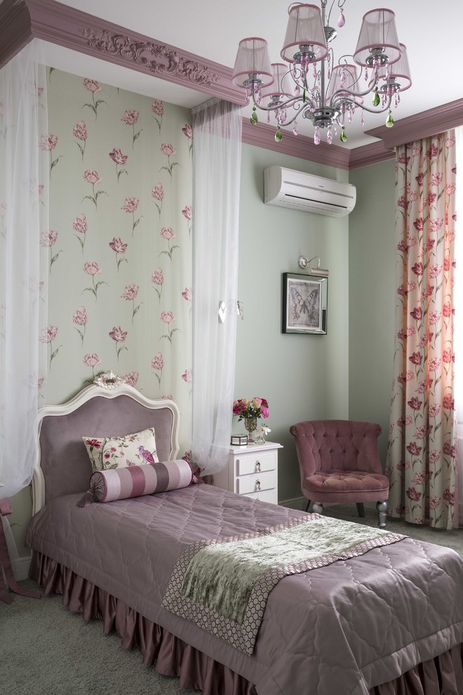 This is an example of a traditional children’s room for girls in Moscow with green walls, carpet and grey floors.