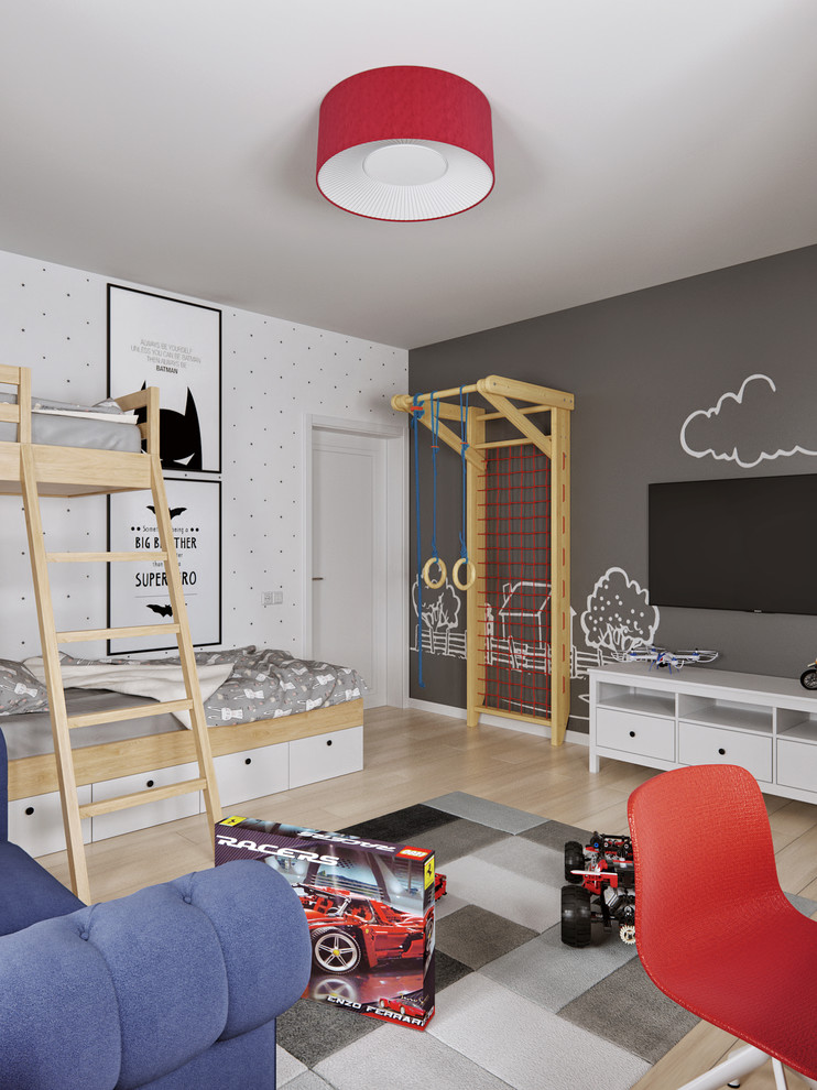 Immagine di una cameretta da bambino da 4 a 10 anni contemporanea di medie dimensioni con pareti bianche, parquet chiaro e pavimento beige