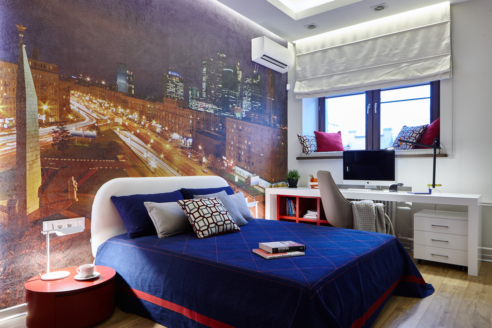 Design ideas for a medium sized contemporary teen’s room for girls in Moscow with multi-coloured walls and light hardwood flooring.