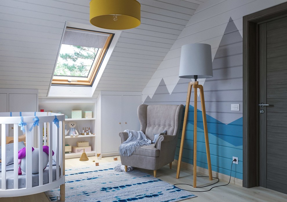 Imagen de habitación de niño de 1 a 3 años nórdica de tamaño medio con suelo laminado