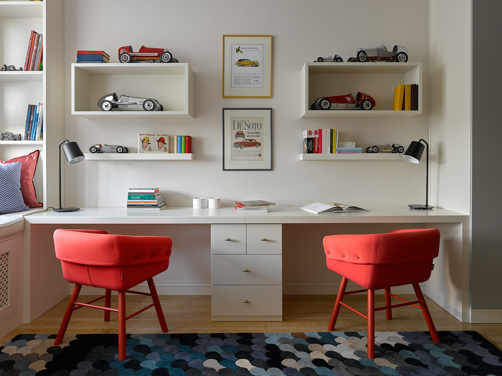 Kids' room - contemporary boy light wood floor kids' room idea in Moscow with white walls