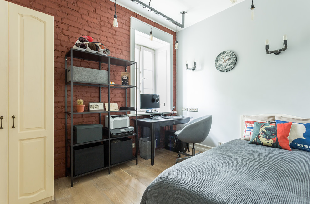 Teen room - small industrial boy light wood floor and beige floor teen room idea in Moscow with gray walls