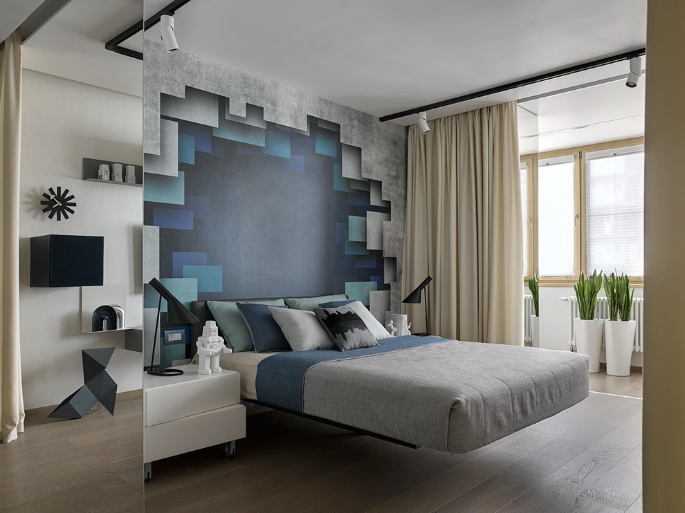 Photo of a large contemporary teen’s room for boys in Moscow with medium hardwood flooring and multi-coloured walls.