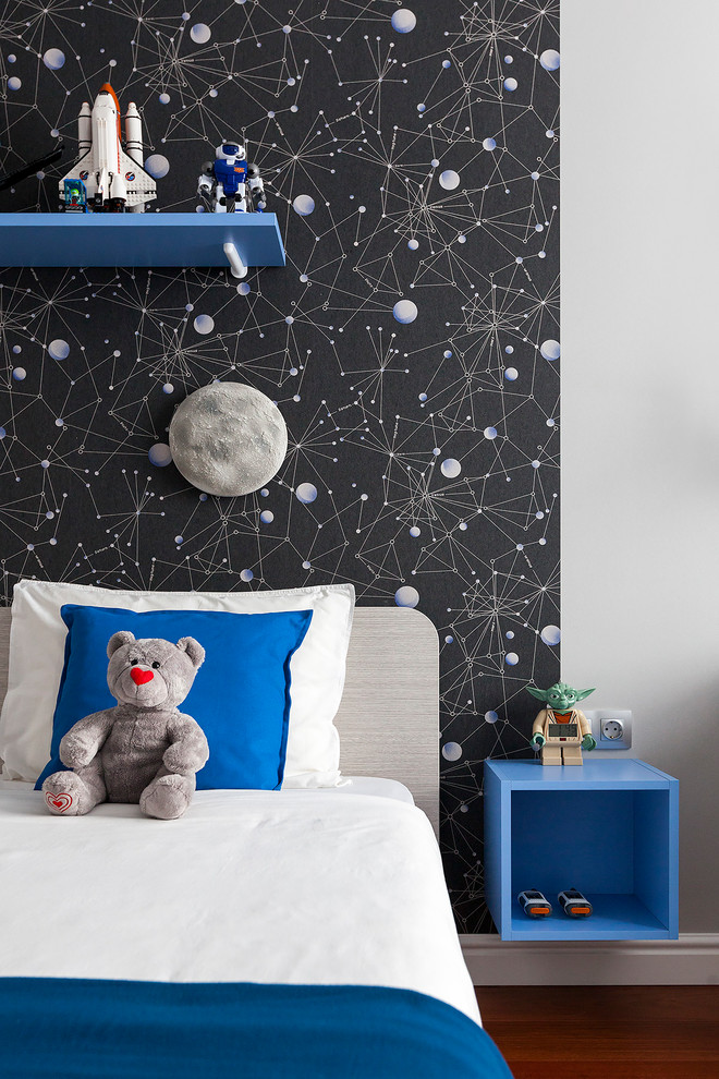 Inspiration for a contemporary boy dark wood floor kids' room remodel in Other with black walls