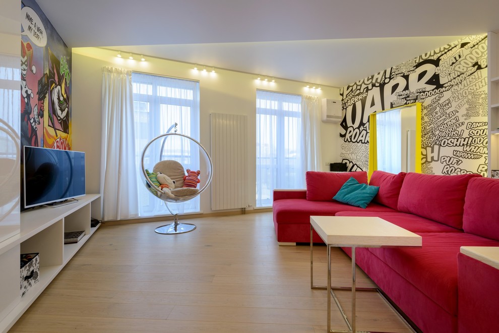 Large trendy gender-neutral light wood floor kids' room photo in Moscow with multicolored walls