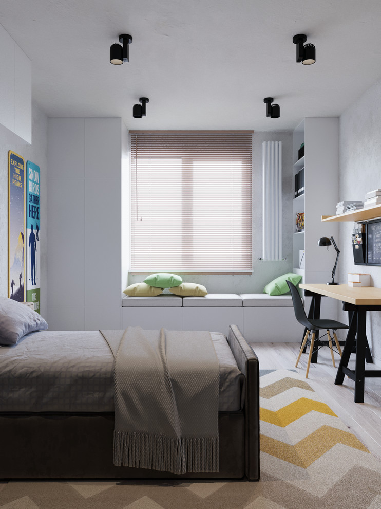 Cette photo montre une chambre d'enfant tendance de taille moyenne avec un mur gris, parquet clair et un sol beige.