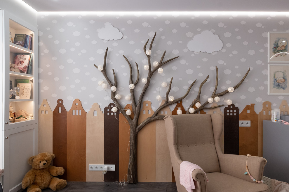 Diseño de dormitorio infantil de 1 a 3 años contemporáneo de tamaño medio con paredes grises, suelo laminado y suelo gris