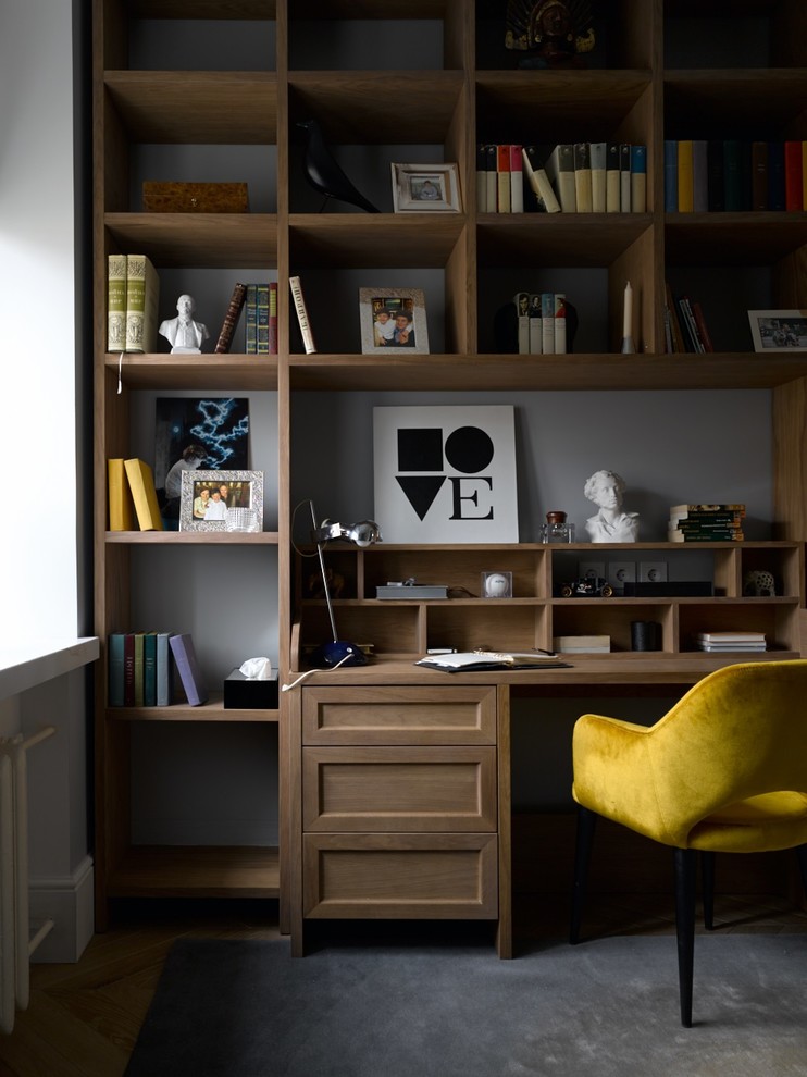 Inspiration for a contemporary boy kids' study room remodel in Moscow with gray walls