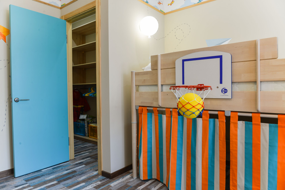 This is an example of a contemporary kids' bedroom for boys in Moscow with cork flooring.
