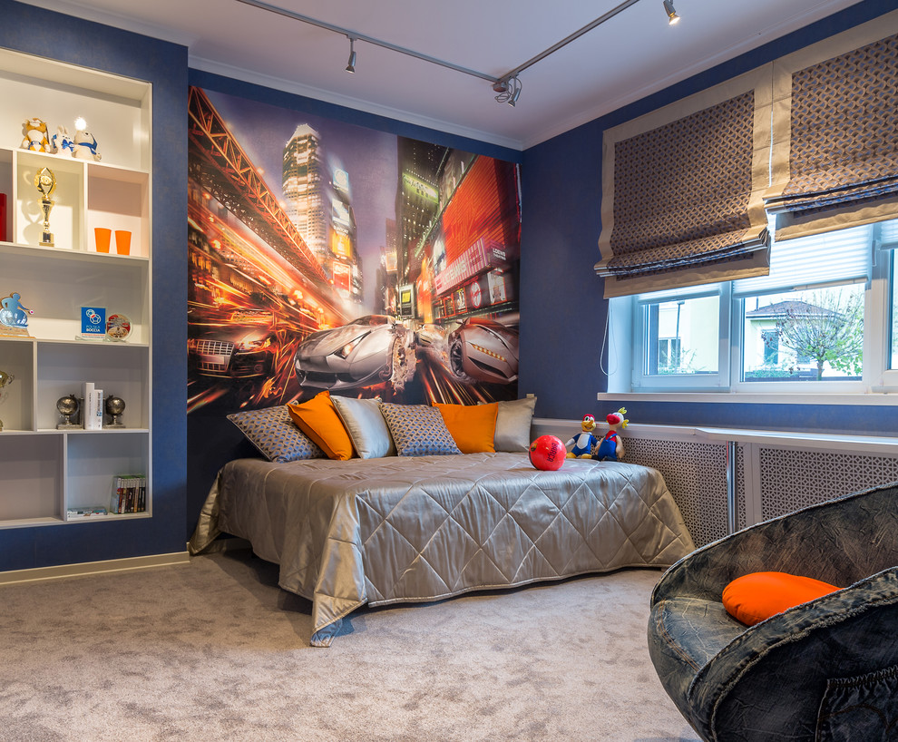 Пример оригинального дизайна: детская в современном стиле с спальным местом, синими стенами и ковровым покрытием для подростка, мальчика