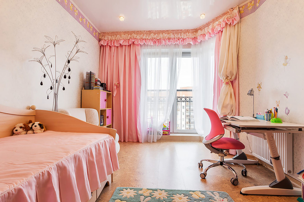 Photo of a medium sized contemporary children’s room for girls in Saint Petersburg with multi-coloured walls, cork flooring and beige floors.