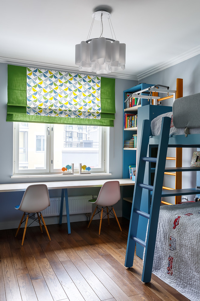 Inspiration for a mid-sized transitional gender-neutral medium tone wood floor and brown floor kids' room remodel in Saint Petersburg with gray walls
