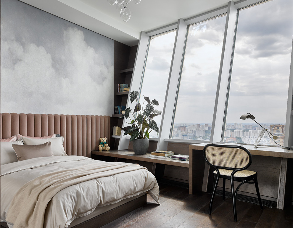 Inspiration for a contemporary gender neutral teen’s room in Moscow with grey walls and brown floors.
