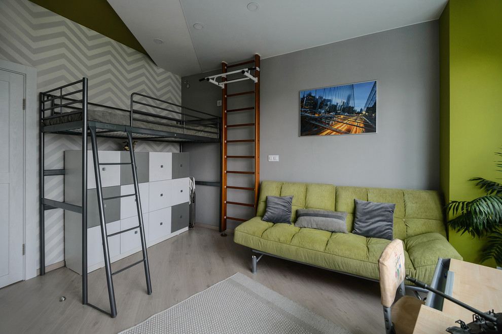 Inspiration för ett mellanstort funkis barnrum kombinerat med sovrum, med grå väggar, laminatgolv och beiget golv