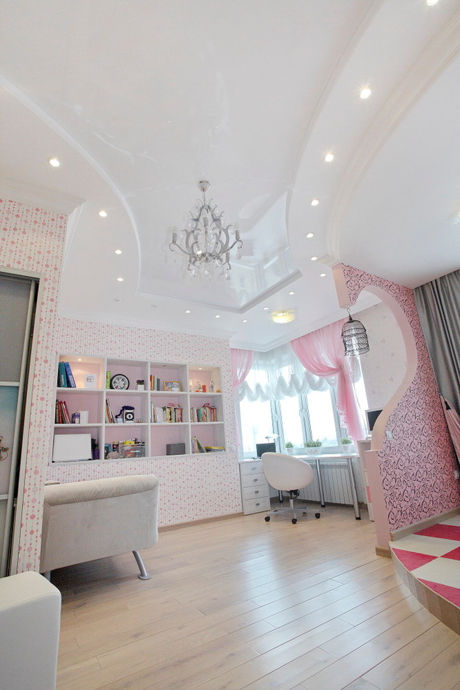 Medium sized eclectic children’s room for girls in Moscow with multi-coloured walls and light hardwood flooring.