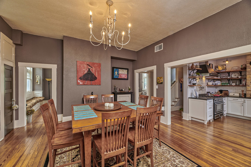 Large eclectic dining room photo in Other