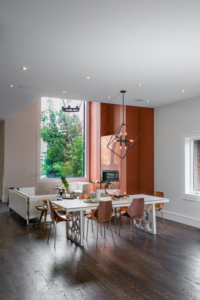 Photo of a large contemporary open plan dining room in Toronto with white walls and dark hardwood flooring.