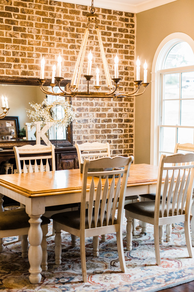 Inspiration for a country dark wood floor enclosed dining room remodel in Other with beige walls and no fireplace