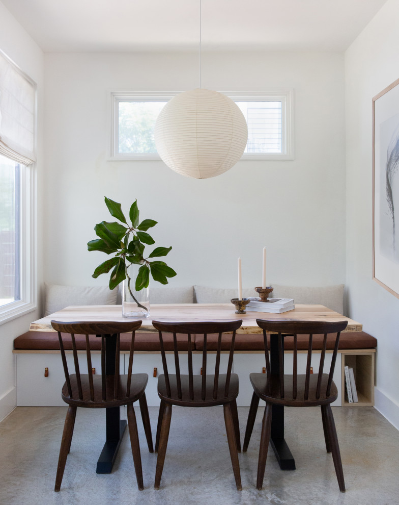 This is an example of a scandinavian dining room in Austin.