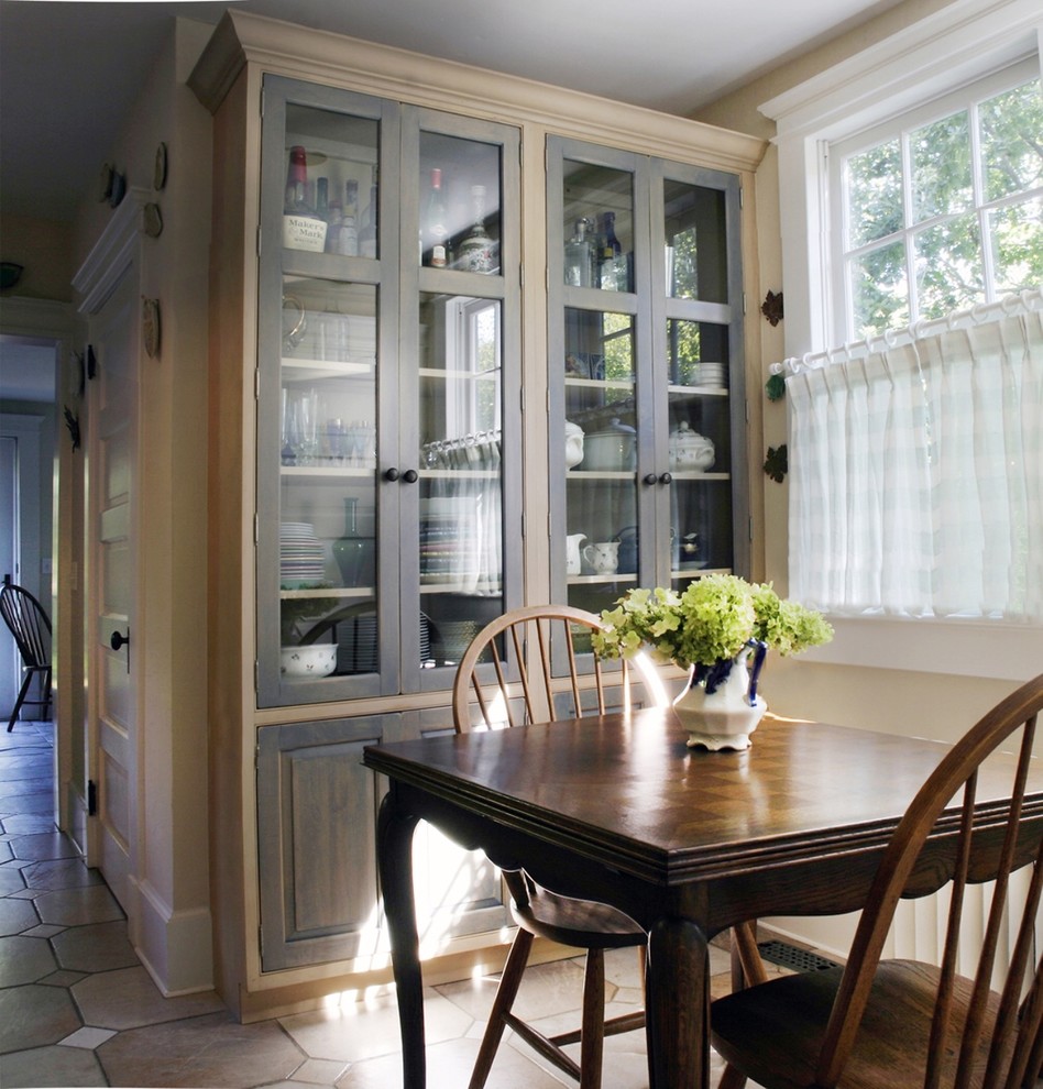 Example of a mid-sized transitional dining room design in New York