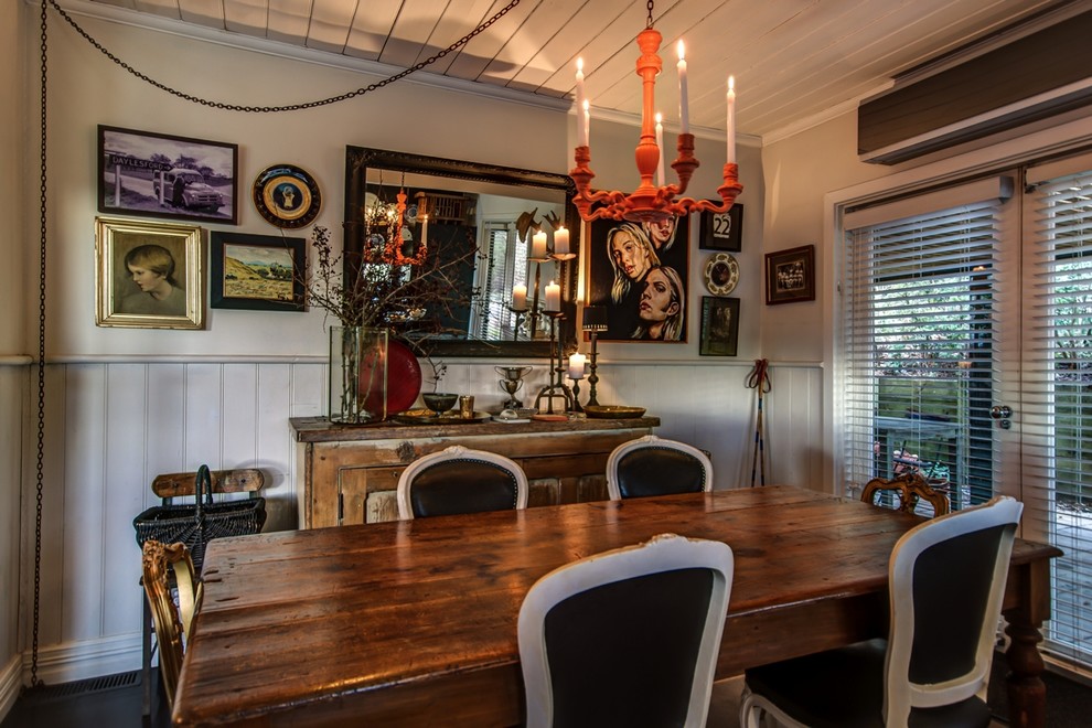 Photo of a bohemian dining room in Melbourne with grey walls and dark hardwood flooring.