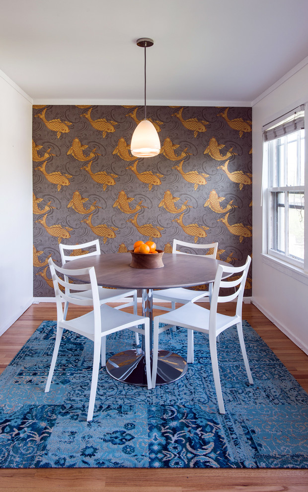 Inspiration for an eclectic medium tone wood floor dining room remodel in Chicago with multicolored walls