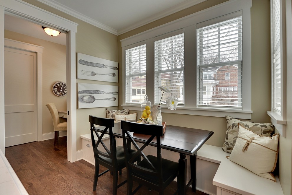 Example of a classic dark wood floor kitchen/dining room combo design in Minneapolis with beige walls
