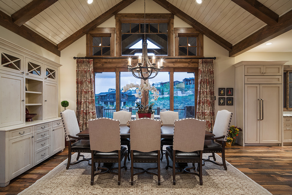 Mountain style dark wood floor dining room photo in Salt Lake City with beige walls