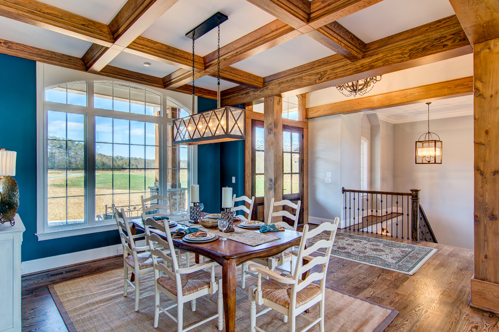 Inspiration for a huge rustic medium tone wood floor dining room remodel in Other with blue walls and no fireplace