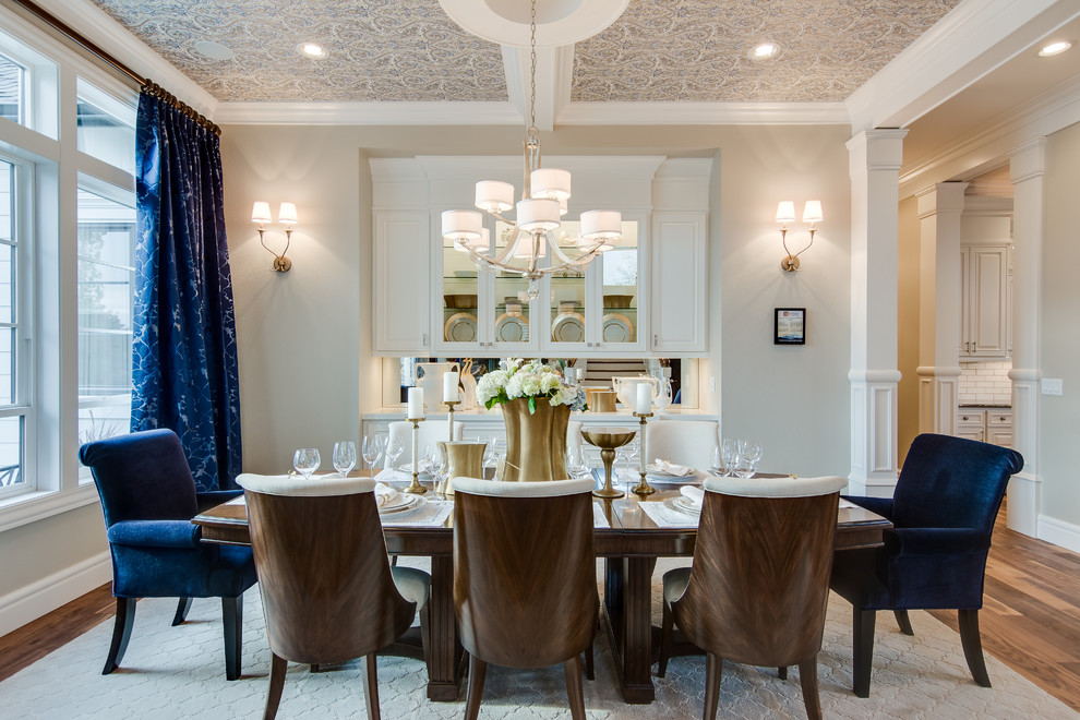 Inspiration for a classic dining room in Portland with beige walls and medium hardwood flooring.