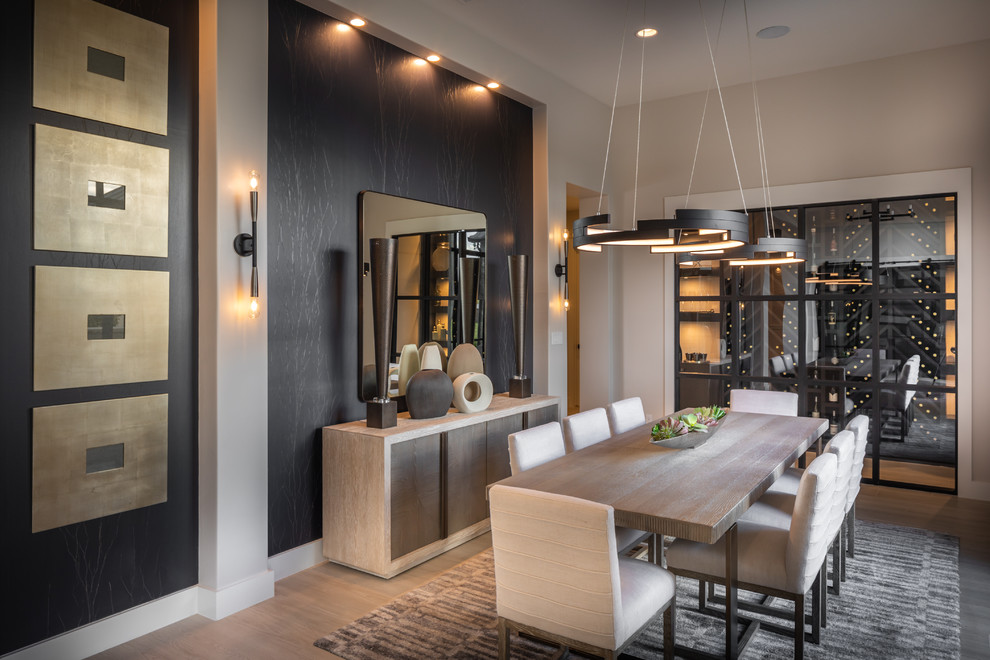Inspiration for a large contemporary porcelain tile and beige floor dining room remodel in Austin with beige walls and no fireplace