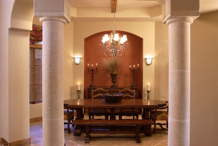 Medium sized mediterranean enclosed dining room in Austin with beige walls, travertine flooring and beige floors.