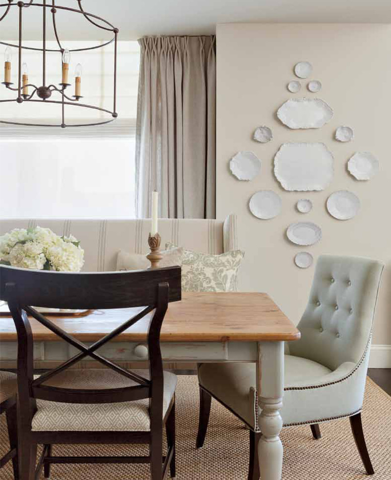 Design ideas for a classic dining room in New York with beige walls and dark hardwood flooring.