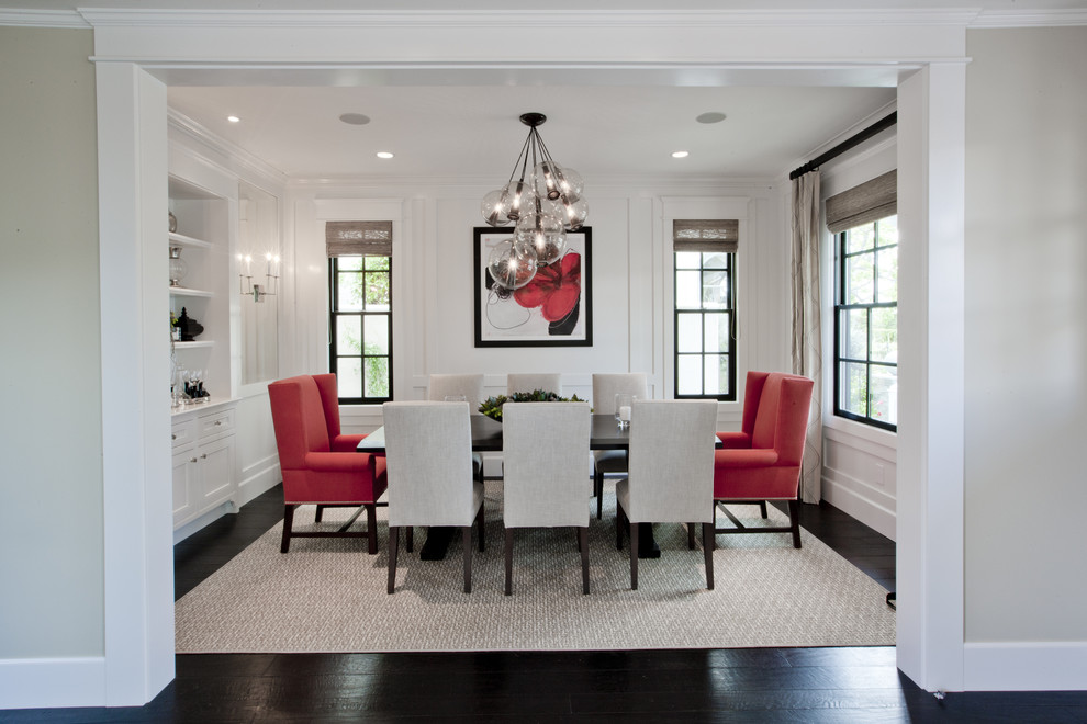 Example of a transitional dining room design in Orange County