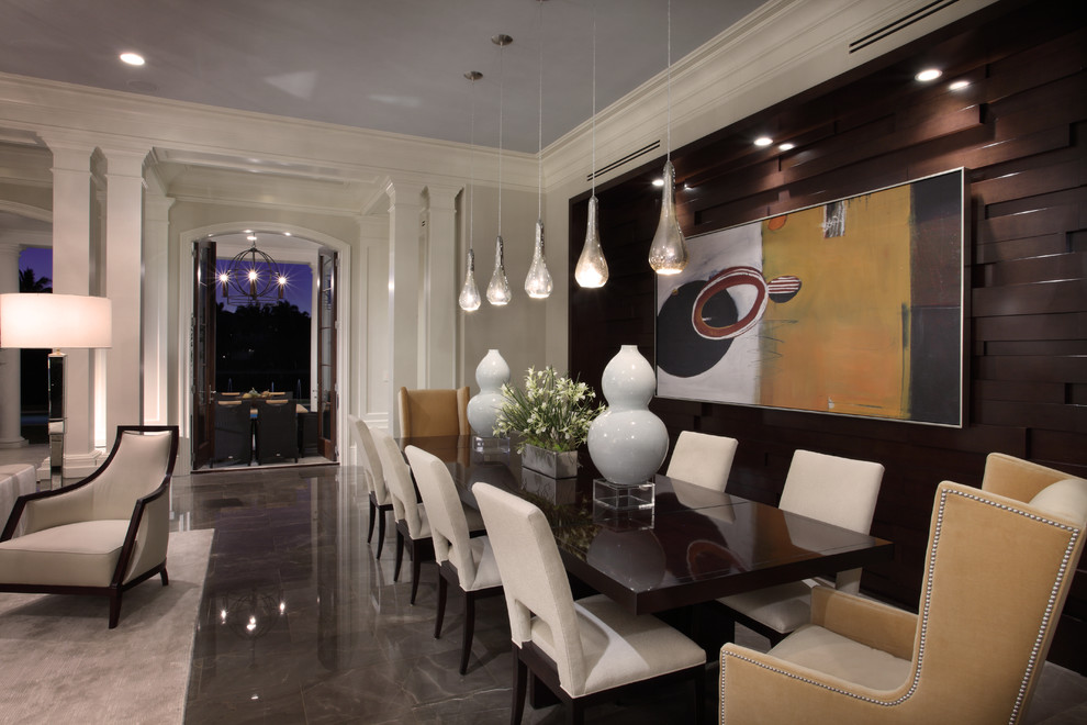 Example of an eclectic dining room design in Miami