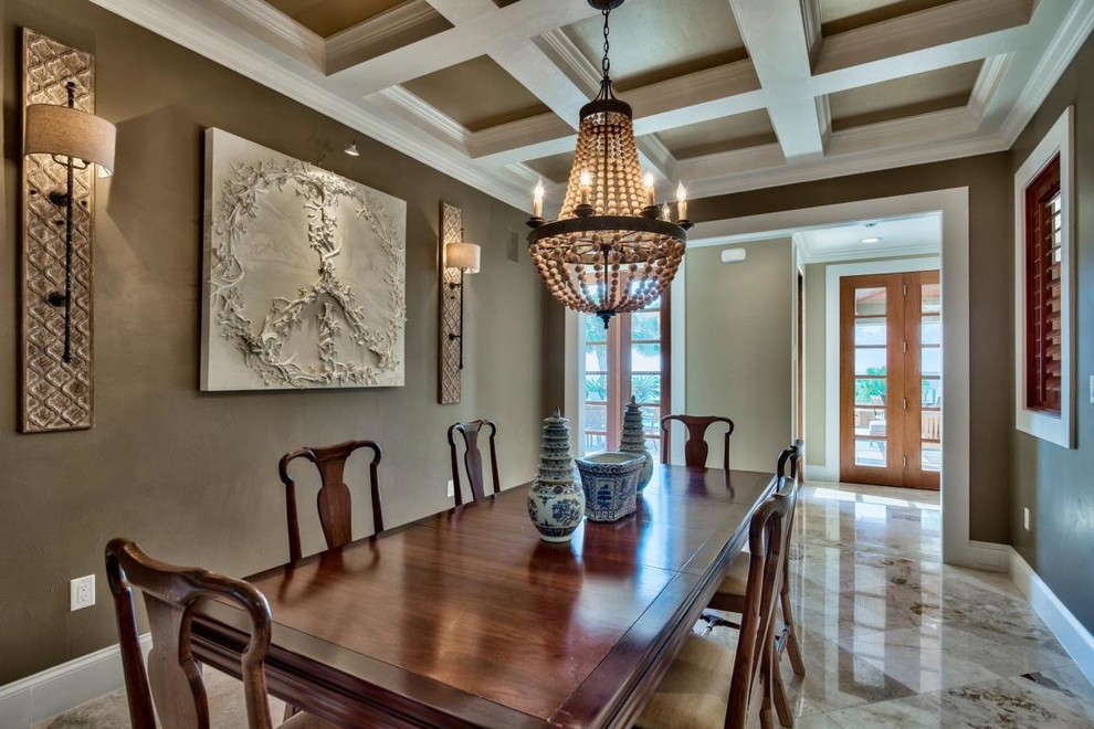 This is an example of a beach style dining room.